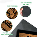 Close-up view of the Schnoodle doormat surface and black rubber backing