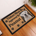 Dogo Argentino welcome doormat styled beside an indoor doorway on a warm wood floor
