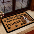 Cavalier King Charles dog doormat displayed by a glass doorway in a welcoming home entry