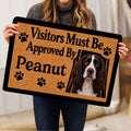 English Springer Spaniel doormat held indoors, showing the dog portrait and paw-print design