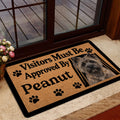 Cairn Terrier door mat styled inside a home entrance near a glass door