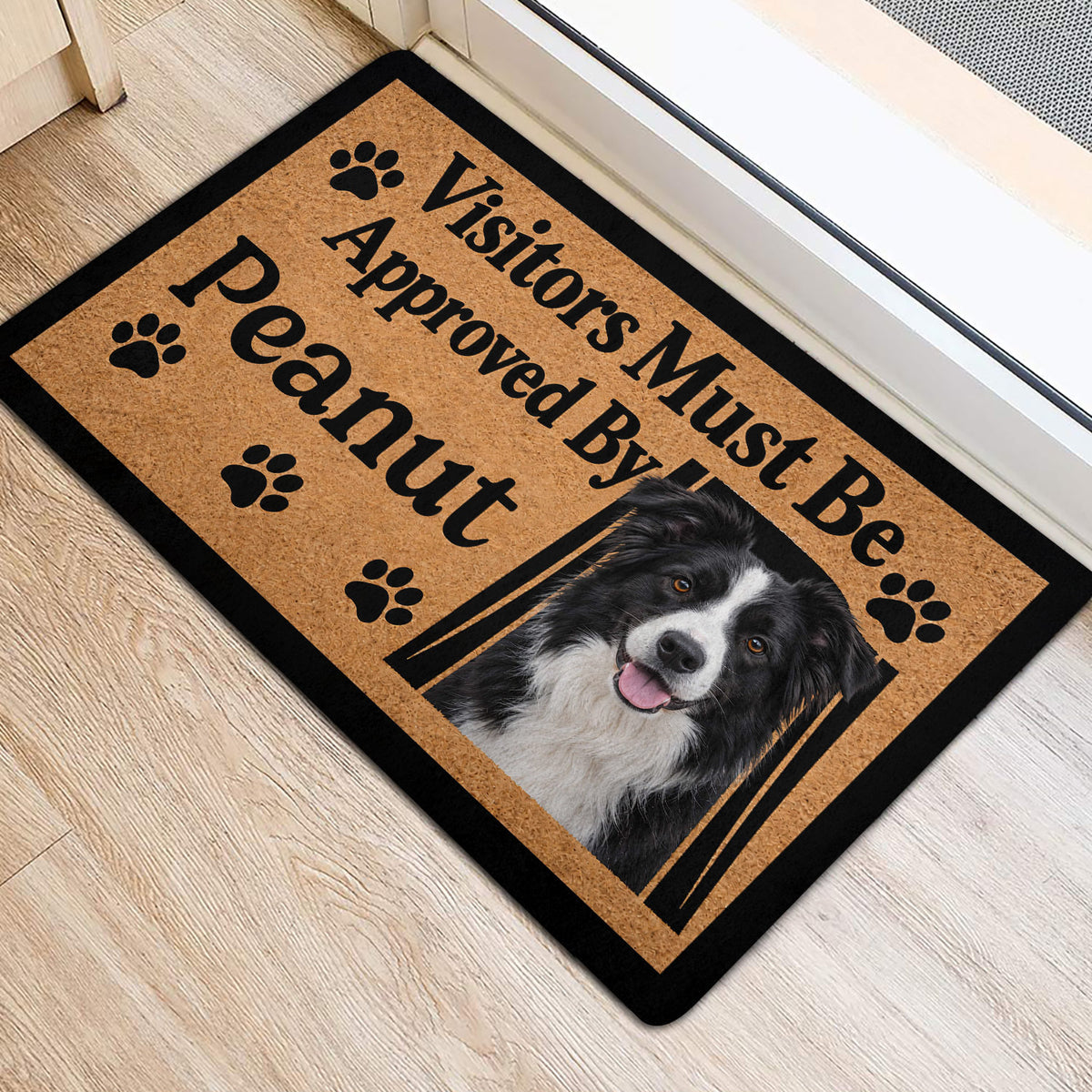 Border Collie door mat styled at an entrance with a black border, paw prints, and dog portrait