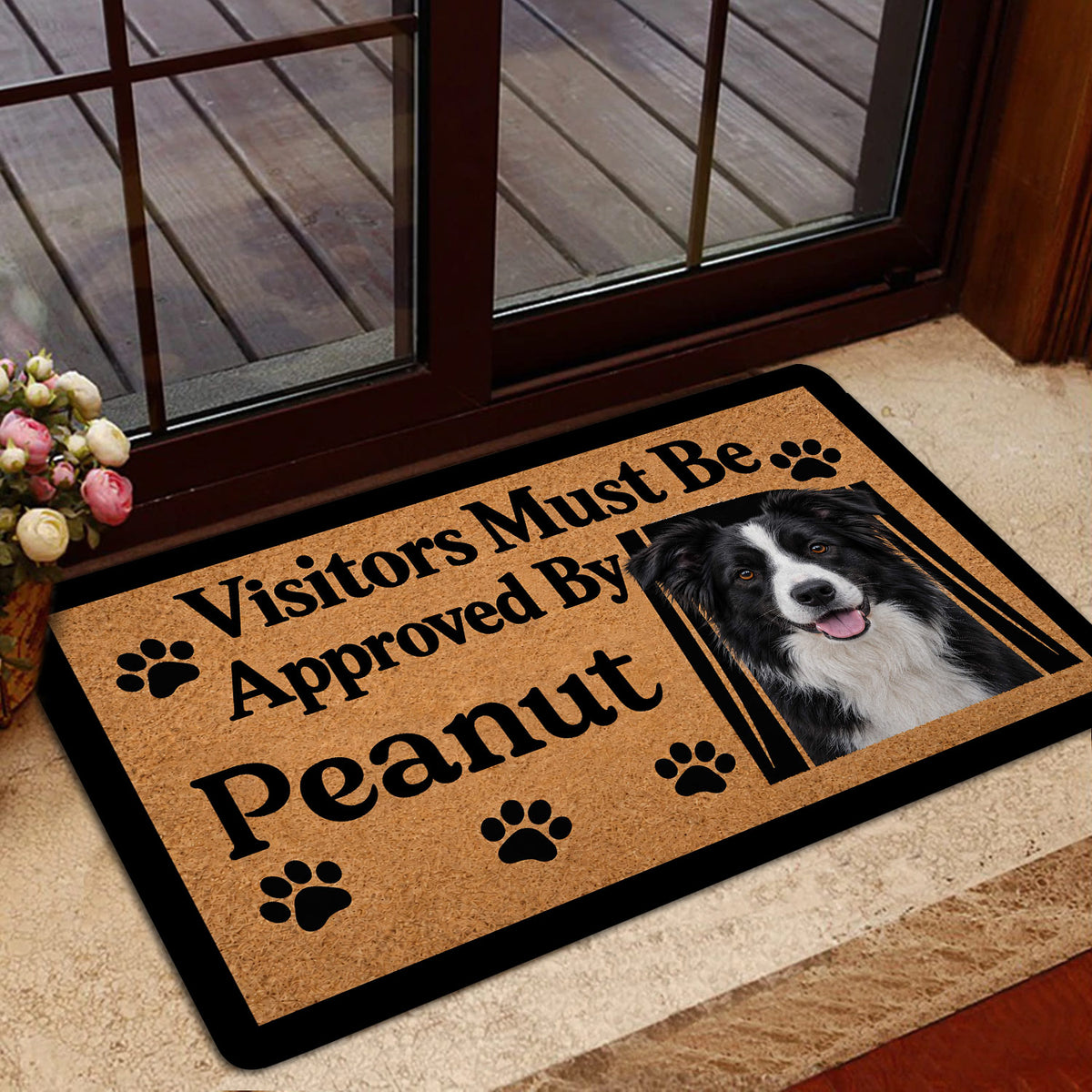 Border Collie entryway rug shown near a glass door with a playful visitor message and paw print accents