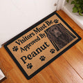 Boykin Spaniel doormat displayed by a white door on a warm wood floor