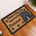 Staffordshire Bull Terrier doormat styled at a home entrance on a warm wood floor