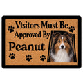 Sheltie portrait doormat with paw prints and playful welcome artwork in tan, black, and white