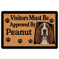 Basset Hound doormat with paw prints, warm tan artwork, and a humorous visitor approval message