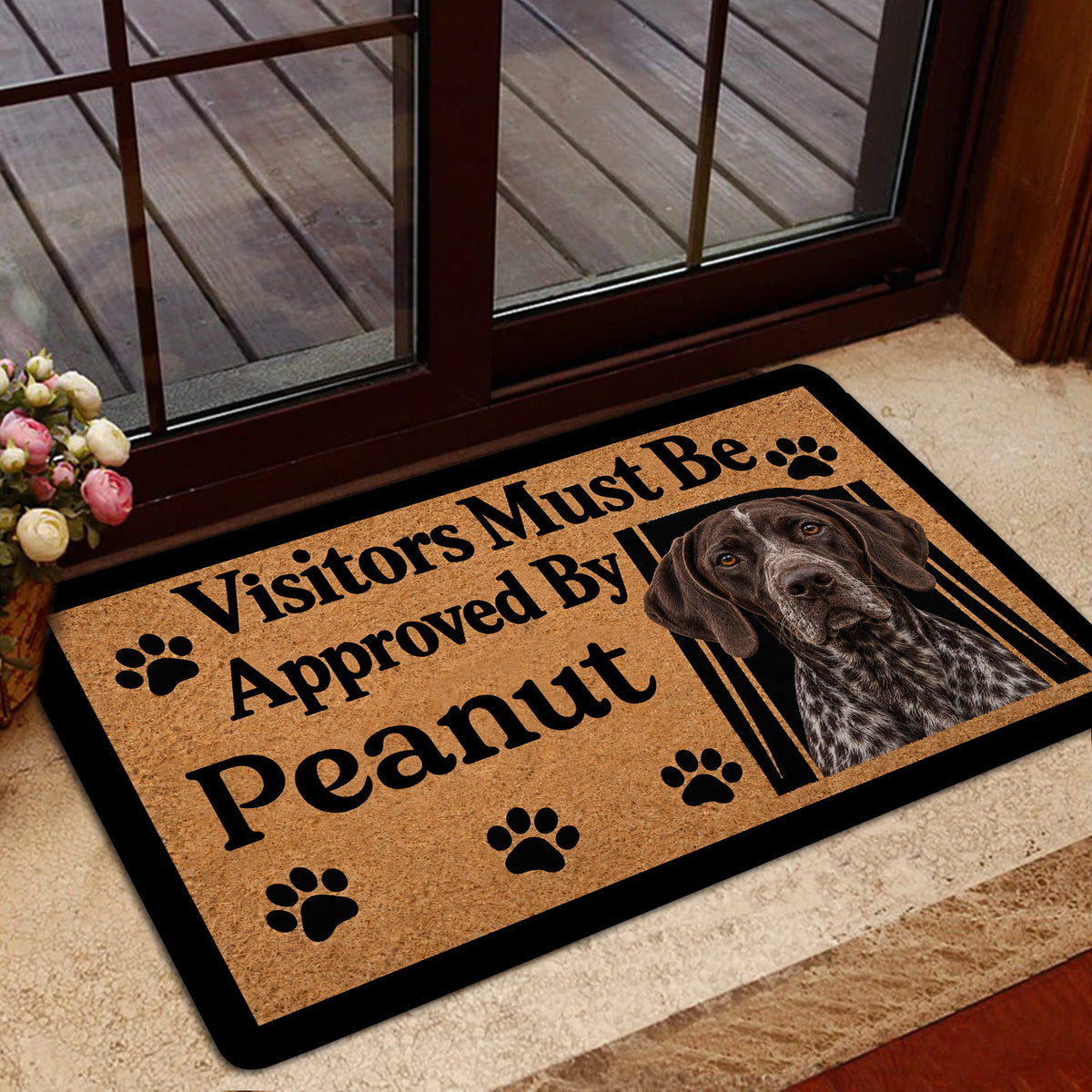 German Shorthaired Pointer doormat styled inside a glass doorway with paw prints and warm tan artwork