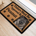 Norwegian Elkhound entryway mat displayed near a doorway with paw prints and bold black lettering
