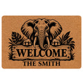 Elephant doormat with black wildlife artwork, tropical leaves, and a welcome sign for an entryway