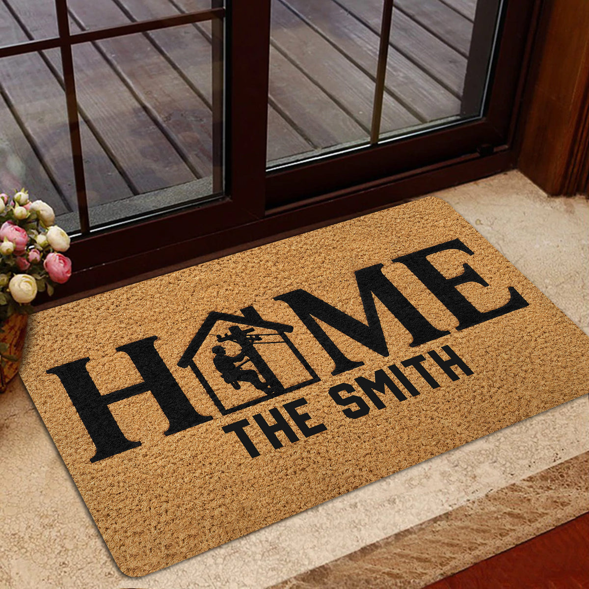 Lineman HOME doormat placed in a welcoming foyer near a glass entry door