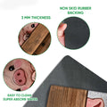 Close-up feature view of pig artwork and the doormat's textured rubber backing