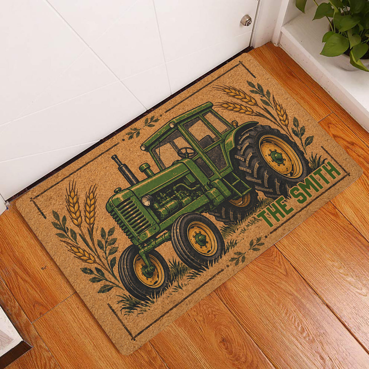 Green tractor entryway rug displayed beside a white door on a warm wood floor