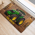 Farm tractor entryway rug styled on light flooring beside a doorway