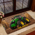Tractor door mat placed at a home entrance with a glass door and indoor decor