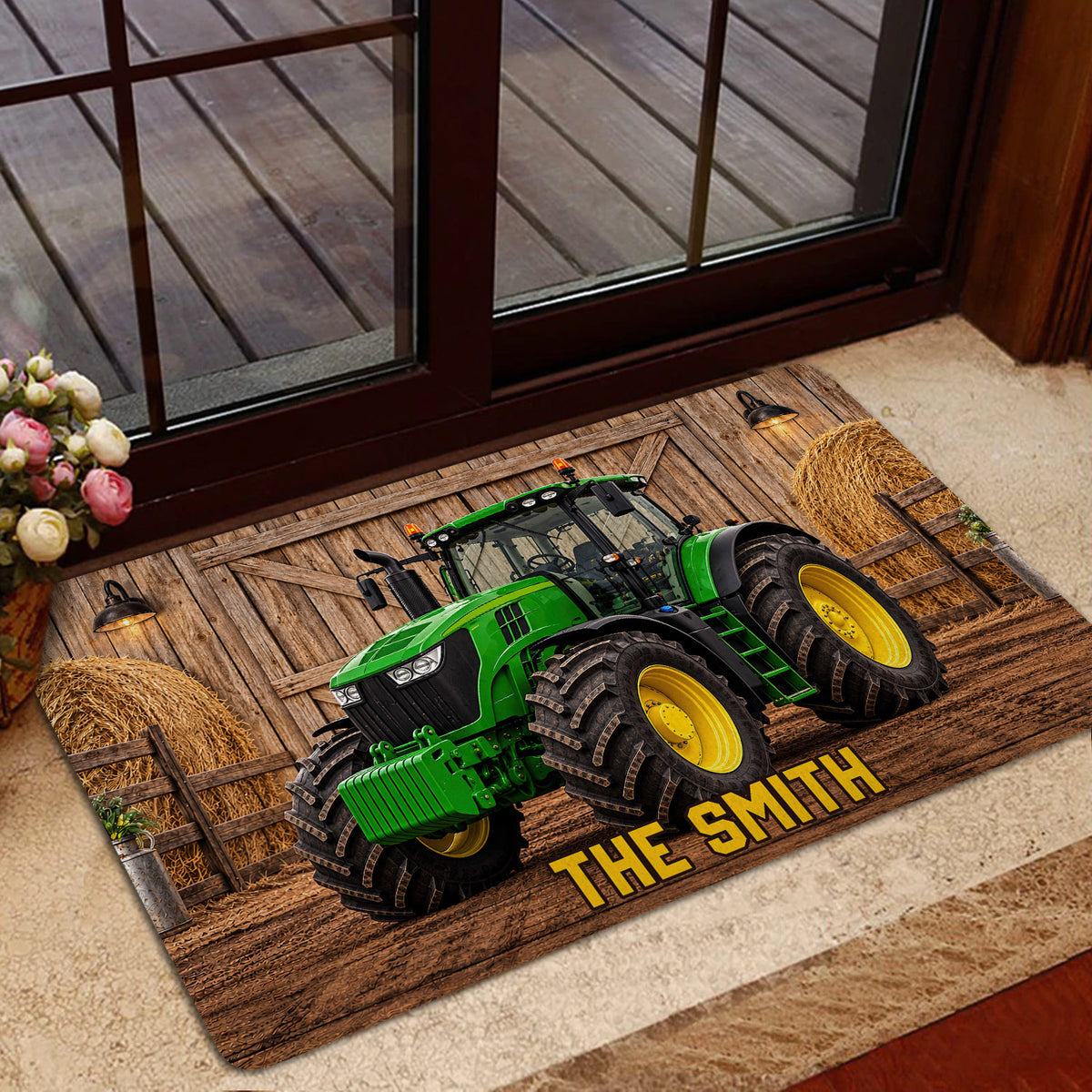 Tractor door mat placed at a home entrance with a glass door and indoor decor
