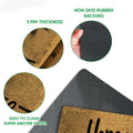 Close-up view of bourbon doormat surface and black rubber backing with thickness and traction details