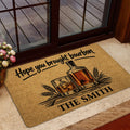 Bourbon welcome mat featuring bottle and whiskey glass artwork in a warmly styled doorway