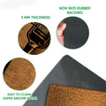 Close-up feature view showing the bourbon doormat surface, rubber backing, and rounded edge detail