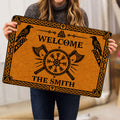 Viking doormat held indoors displaying ravens, axes, compass symbol, and black knotwork artwork
