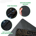 Close-up detail of Viking doormat artwork and dark rubber backing with printed knotwork design