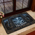 Viking doormat displayed inside a glass doorway with ravens, runic-style border, and dark Nordic artwork