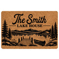 Lake house doormat featuring a mountain lake, pine trees, dock, canoe, and rustic black artwork