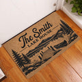 Lake house doormat displayed in an entryway with mountain, forest, dock, and canoe artwork