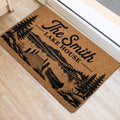 Lake house entryway rug shown beside a door with rustic mountain and lakeside scenery