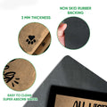Close-up feature view showing the printed doormat surface and black rubber backing