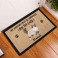 Ragdoll cat entryway rug displayed by a front door on a warm wood floor
