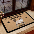 Ragdoll cat doormat styled at a home entrance with glass doors and floral decor