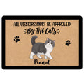 Exotic Shorthair cat doormat with paw prints and playful visitor approval artwork