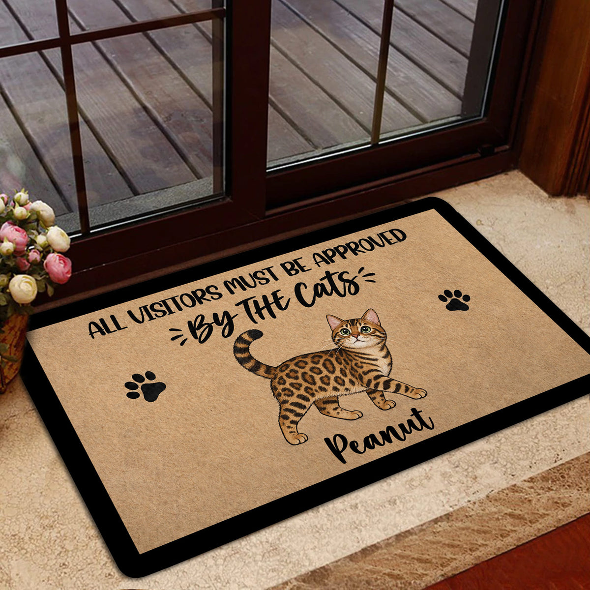 Bengal cat doormat styled near a glass entry door with illustrated cat and playful lettering