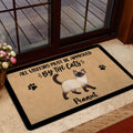 Siamese cat doormat styled in a home entrance beside a glass door