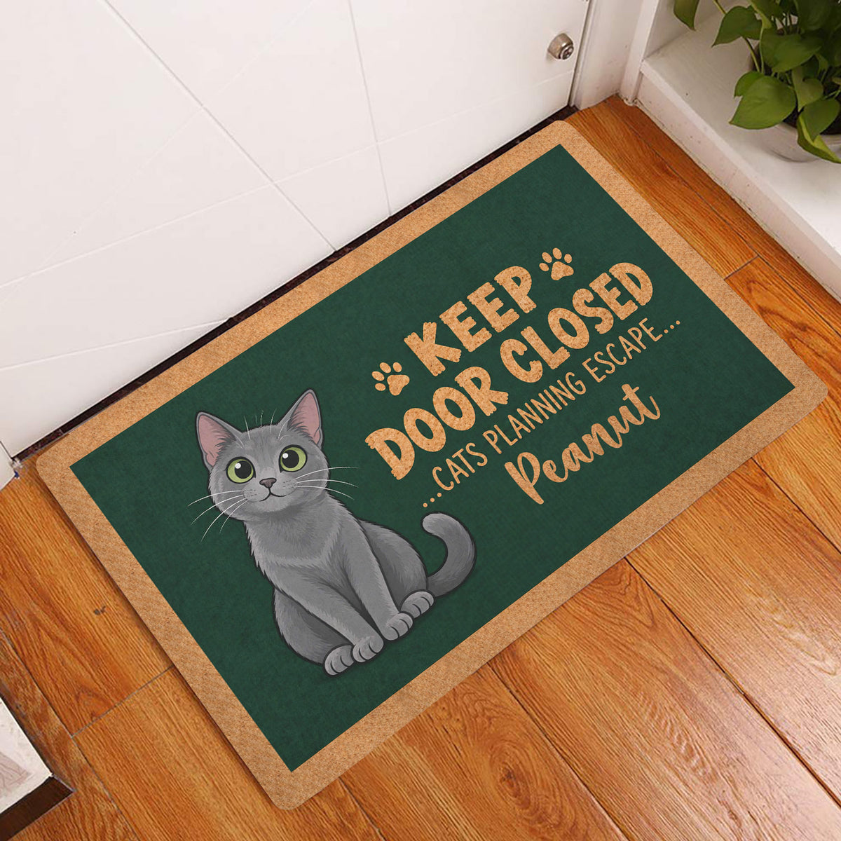 Russian Blue cat entryway mat styled beside a white door on a warm wood floor