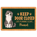 Illustrated Scottish Fold cat doormat with a playful green and tan design for a cat-themed entryway