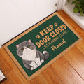 Exotic Shorthair cat entryway rug styled beside a white door on a warm wood floor