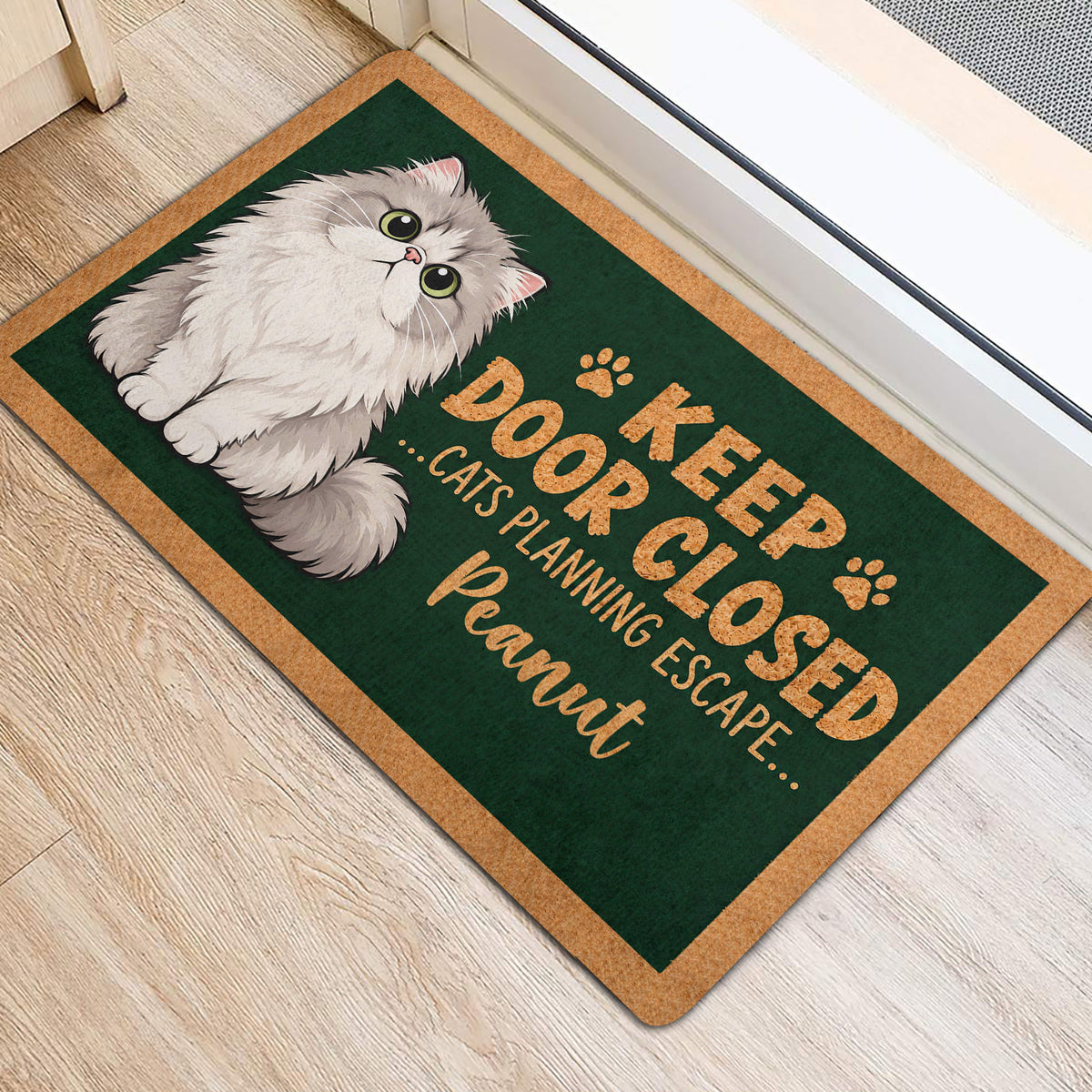 Fluffy Persian cat door mat placed near an entryway with playful cat-themed lettering