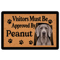 Weimaraner doormat with a gray dog portrait, paw prints, and a playful visitor message