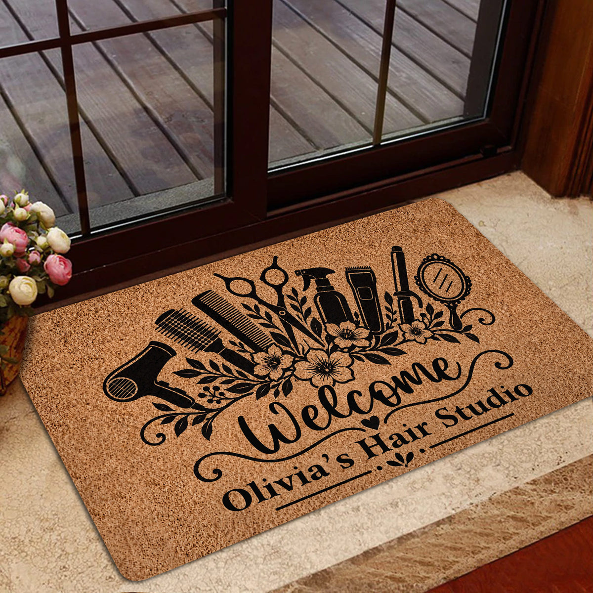 Hairstylist entryway mat styled by a glass door with floral hair tool design and welcome lettering