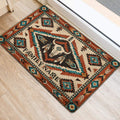 Geometric American Native rug with bison skull artwork positioned beside an entrance