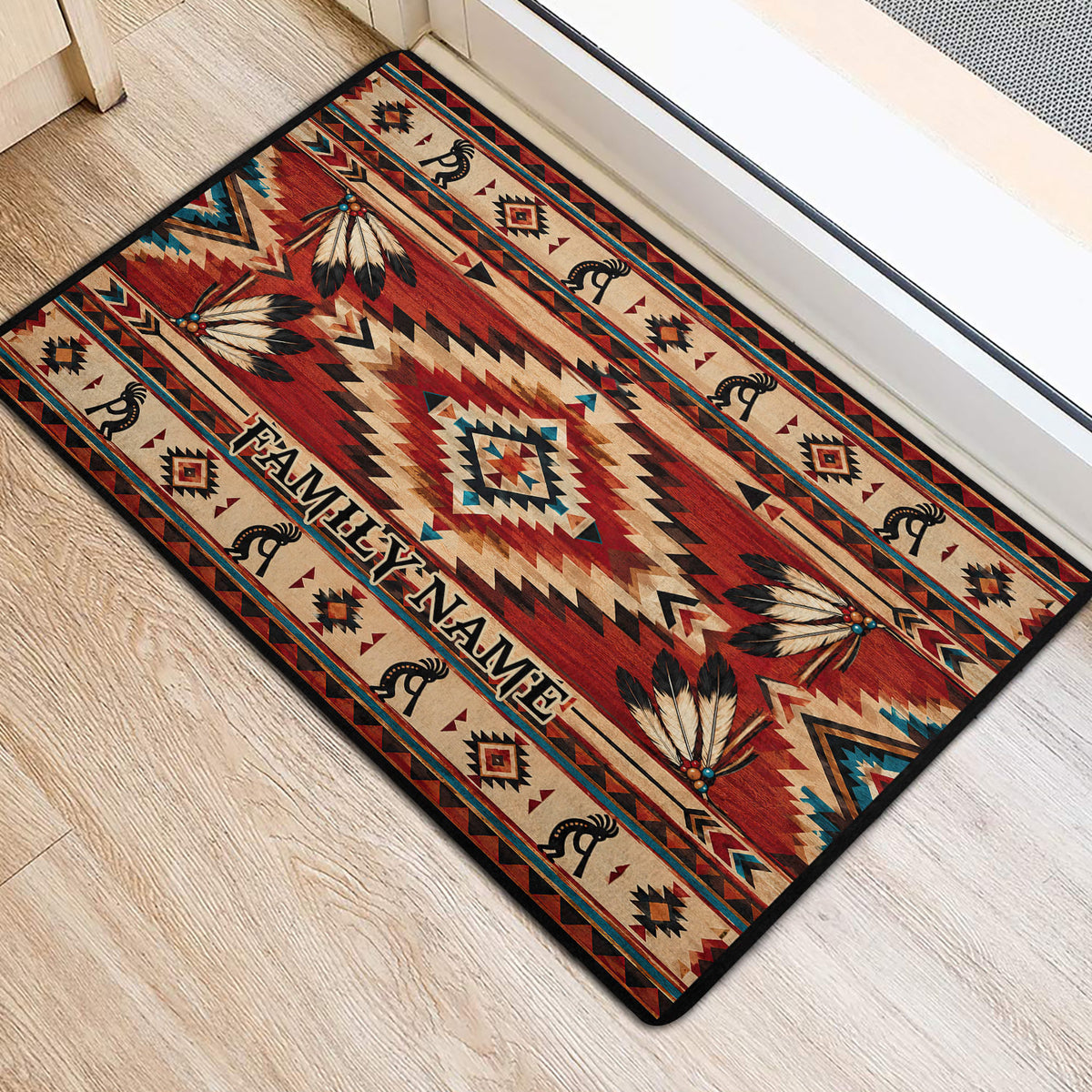 American Native patterned door mat placed at an entrance, featuring geometric shapes, feathers, and earthy red tones