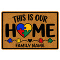 Autism doormat with a colorful puzzle-piece heart, family welcome theme, and warm tan background