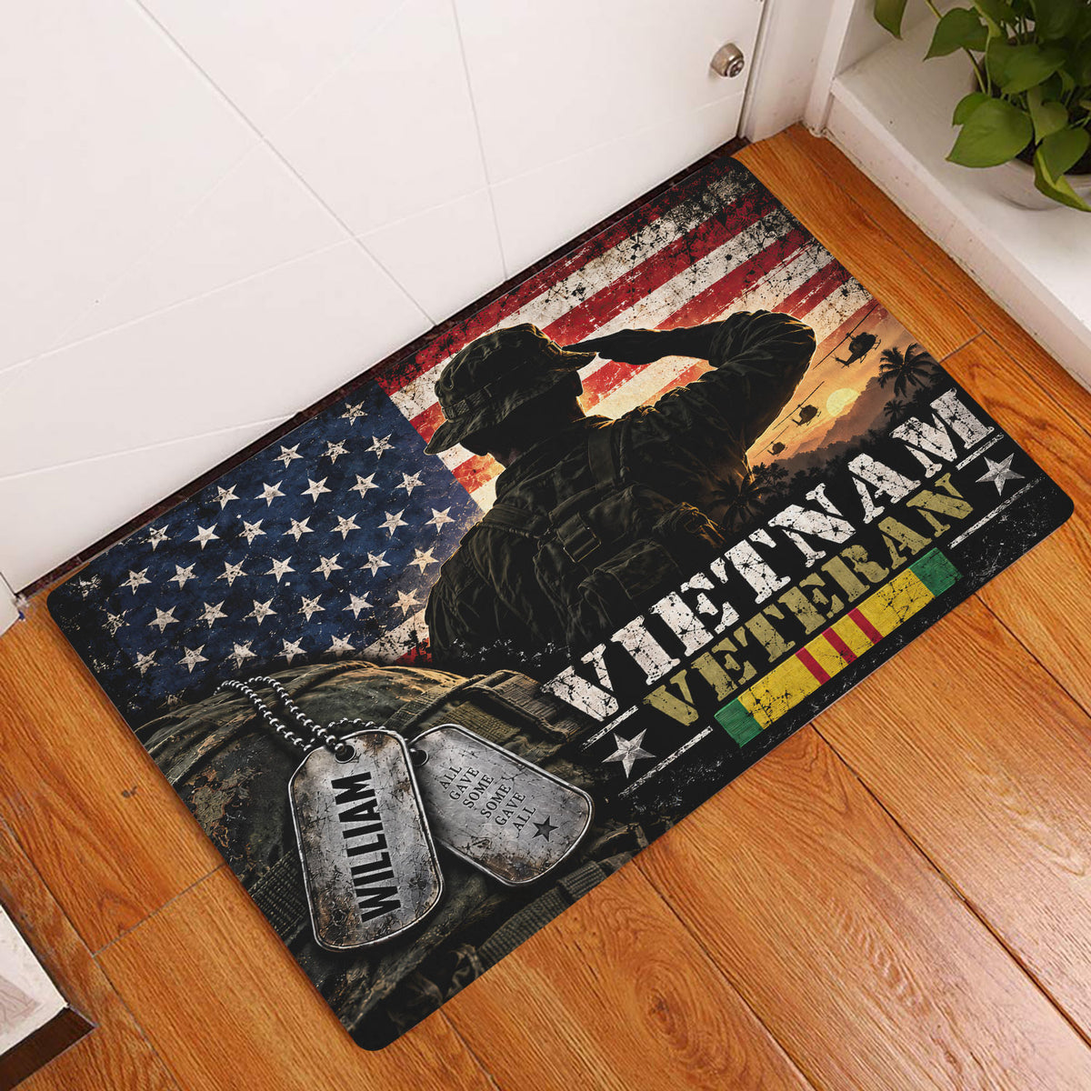 Vietnam veteran doormat displayed at an indoor entryway beside a white door and wood floor