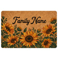 Sunflower doormat with warm golden blooms, green foliage, and a tan textured background