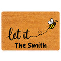 Bee-themed doormat with a flying honeybee illustration and warm golden entryway design