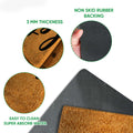 Bee doormat detail showing the textured printed surface and black rubber backing
