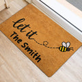 Golden bee entryway mat with a playful flying bee trail and welcome-style lettering