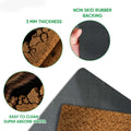 Bear doormat feature view showing textured artwork, dark rubber backing, thickness, and close-up details